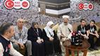 Diyanet İşleri Başkanı Erbaş, en genç ve en yaşlı hacı adaylarıyla buluştu